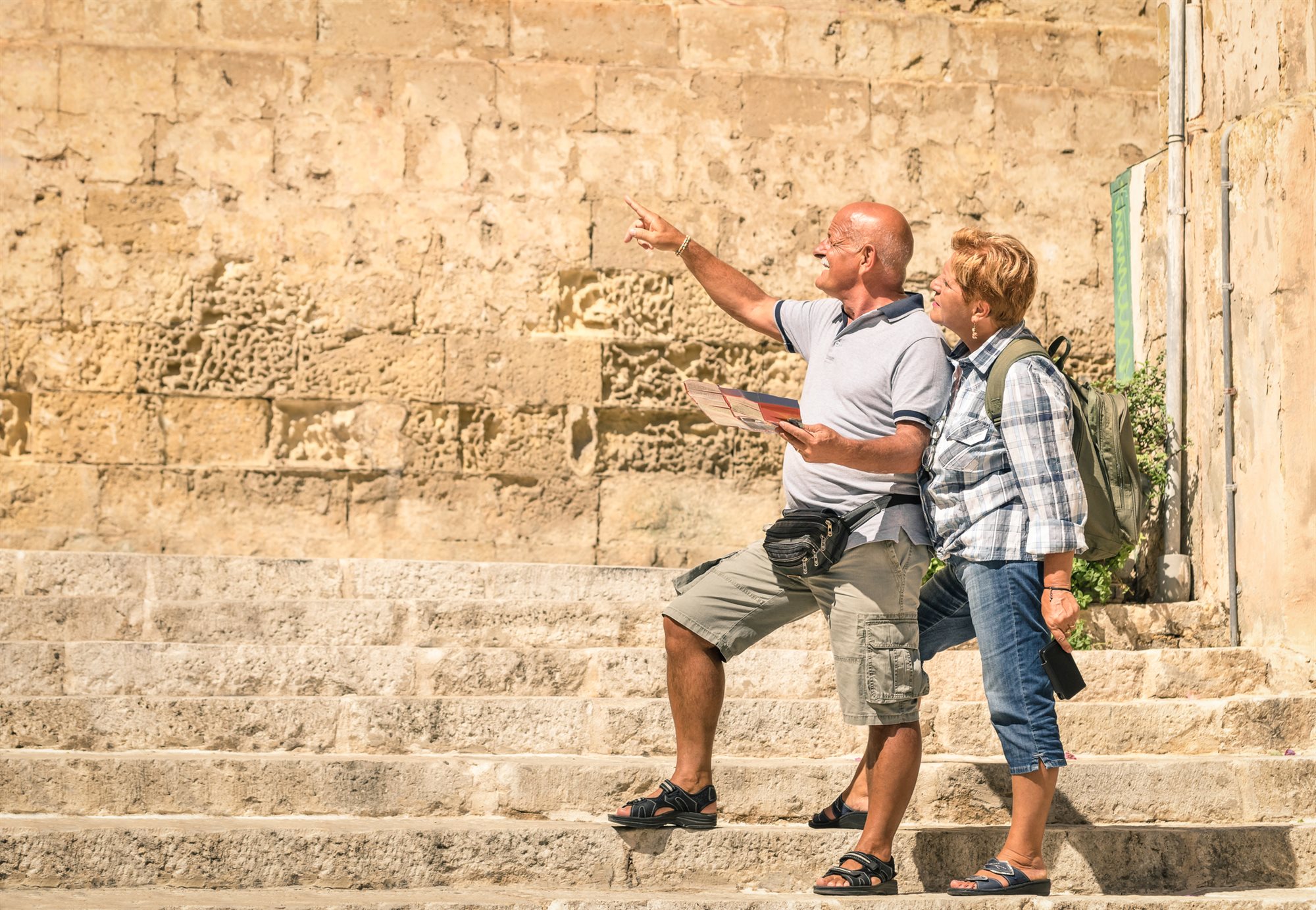 A mature couple exploring a historic old town